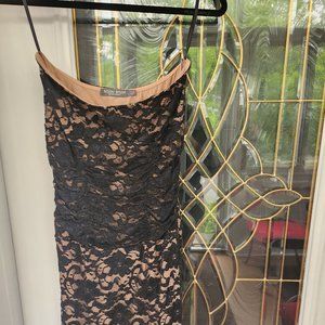 Black Strapless Lace Illusion Dress. Great condition. Can be worn for cocktails.